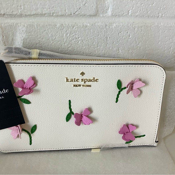 kate spade Handbags - Kate Spade Cream Wristlet with Pink Floral Appliques